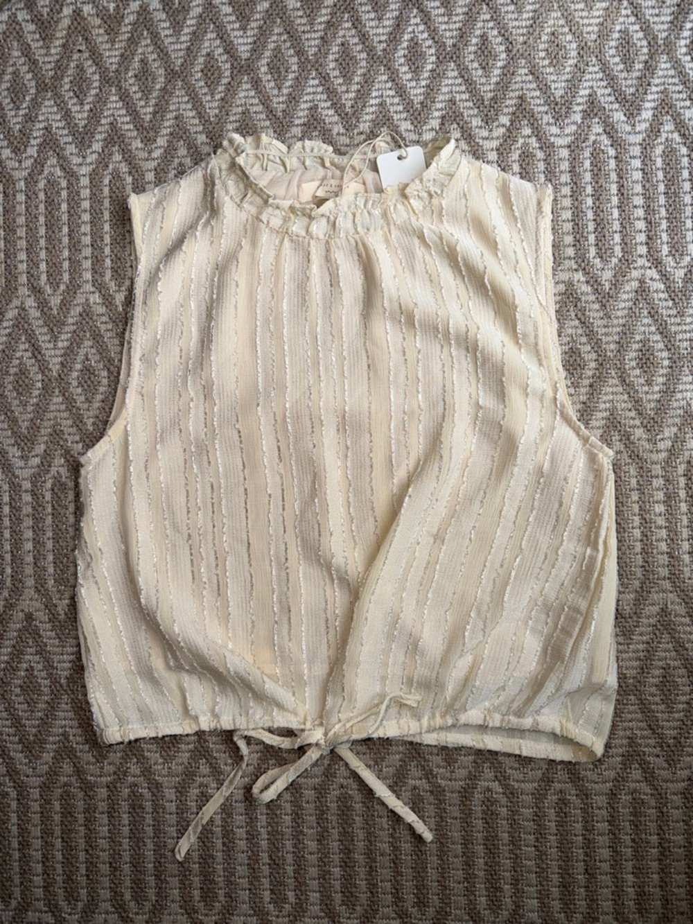 Cream Sleeveless Ruffle-Neck Tie-Hem Top